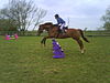 Evie Gullis Jumping Her Horse.JPG