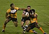 Lance hohaia running into the defence (rugby league).jpg